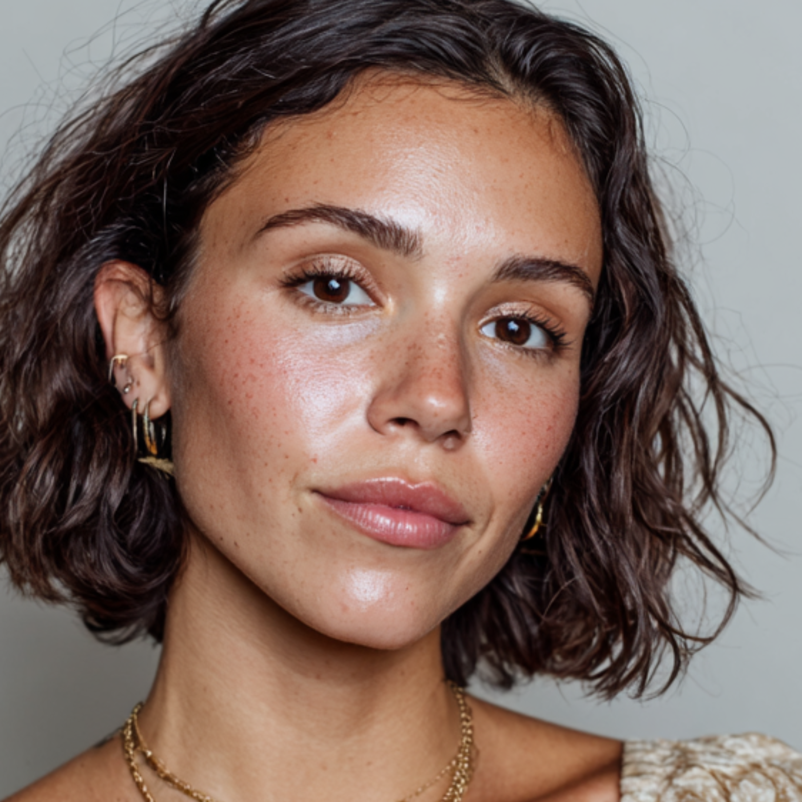 Close view of smooth, even skin prepared for eye and lip makeup