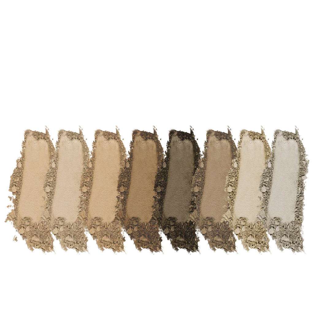 Set of eight eyeshadow swatches in neutral tones on a white background